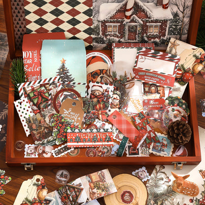 Collection of Christmas-themed cards and decorations in a wooden box.