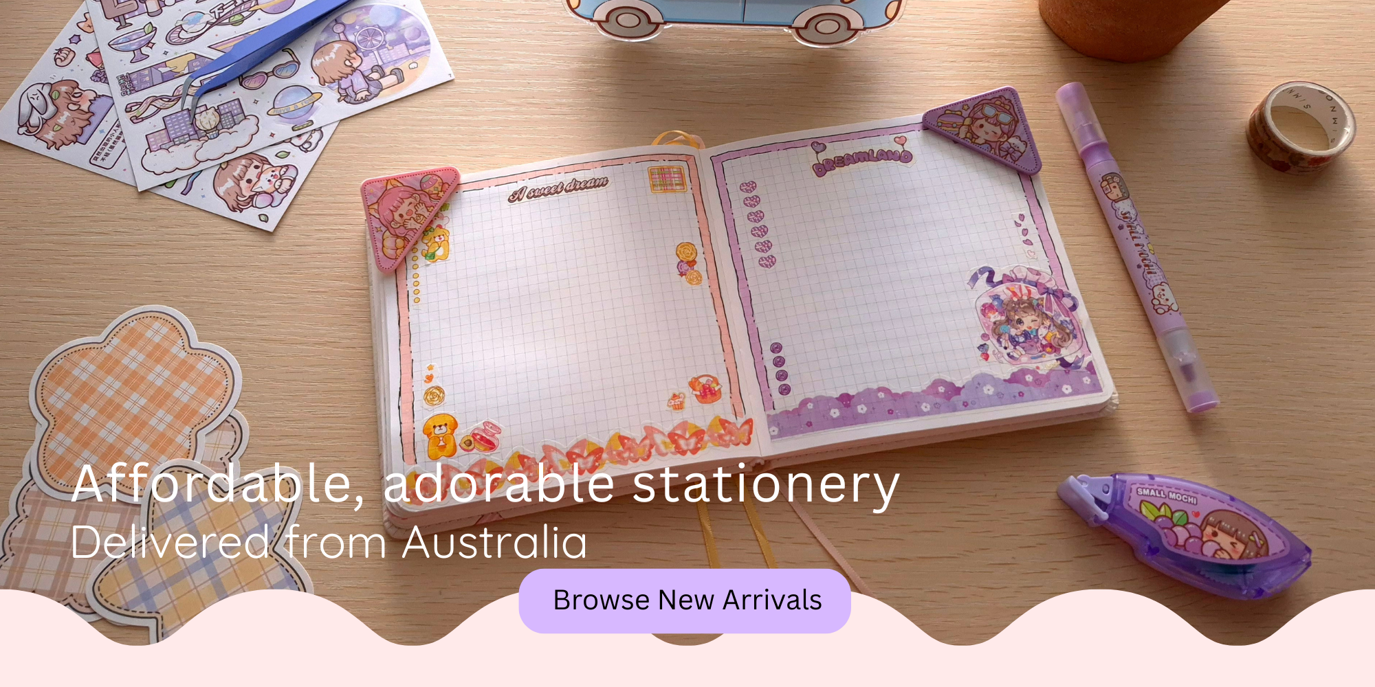Flat lay of cute and kawaii stationery — journaling supplies including washi tape, sticker sheets, memo pads and a softcover notebook. Handpicked and shipped from Australia